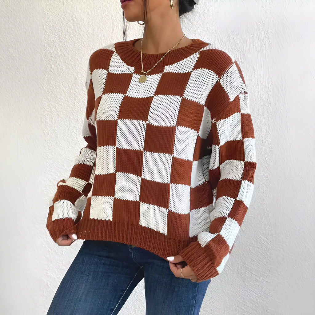 Dark brown women's plaid pullover sweater with long sleeves and a loose fit.