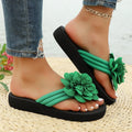 Women's floral flip-flop sandals in beige with a lightweight EVA sole.