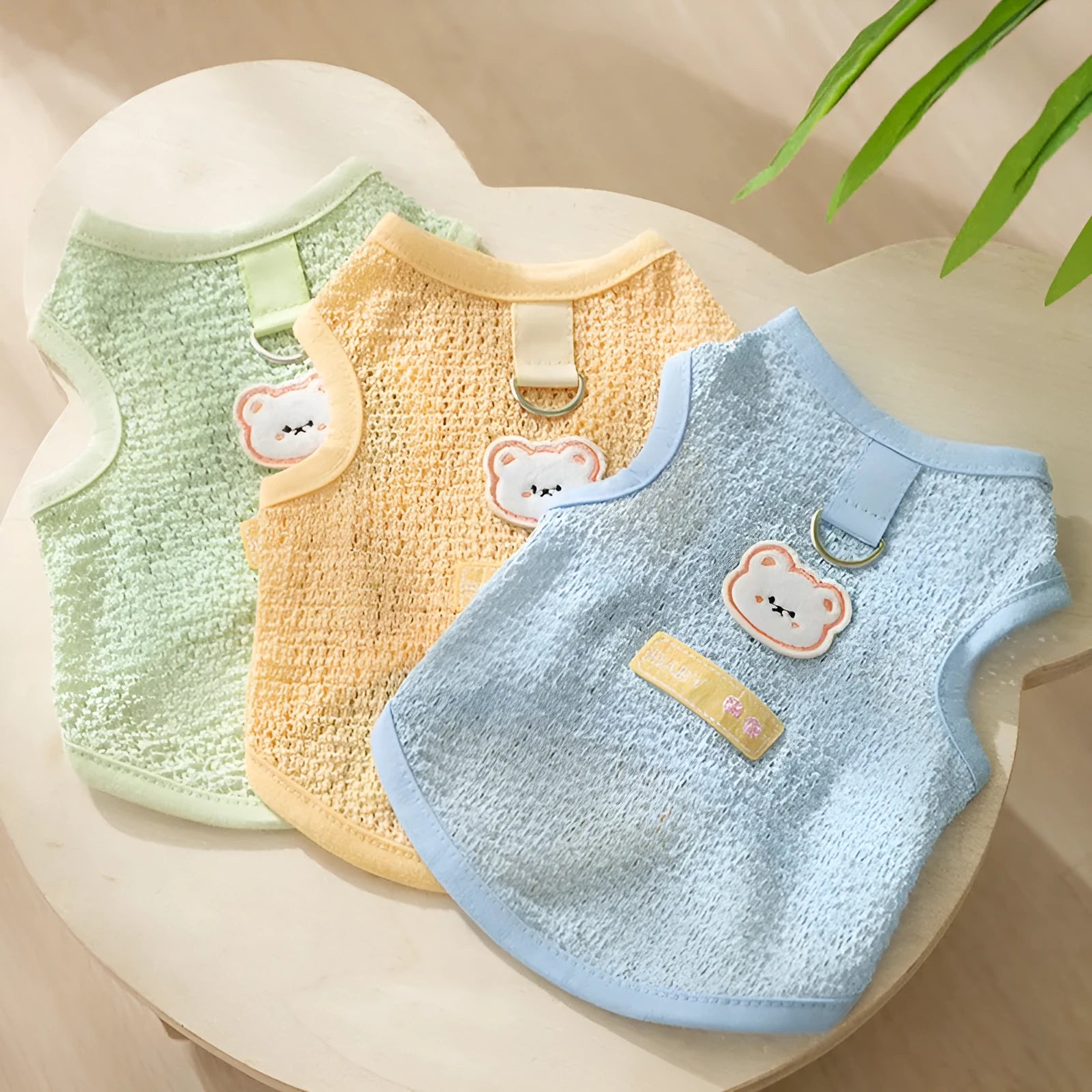 Cat wearing bear patch knitted clothing with hollowed-out breathable design in blue colour