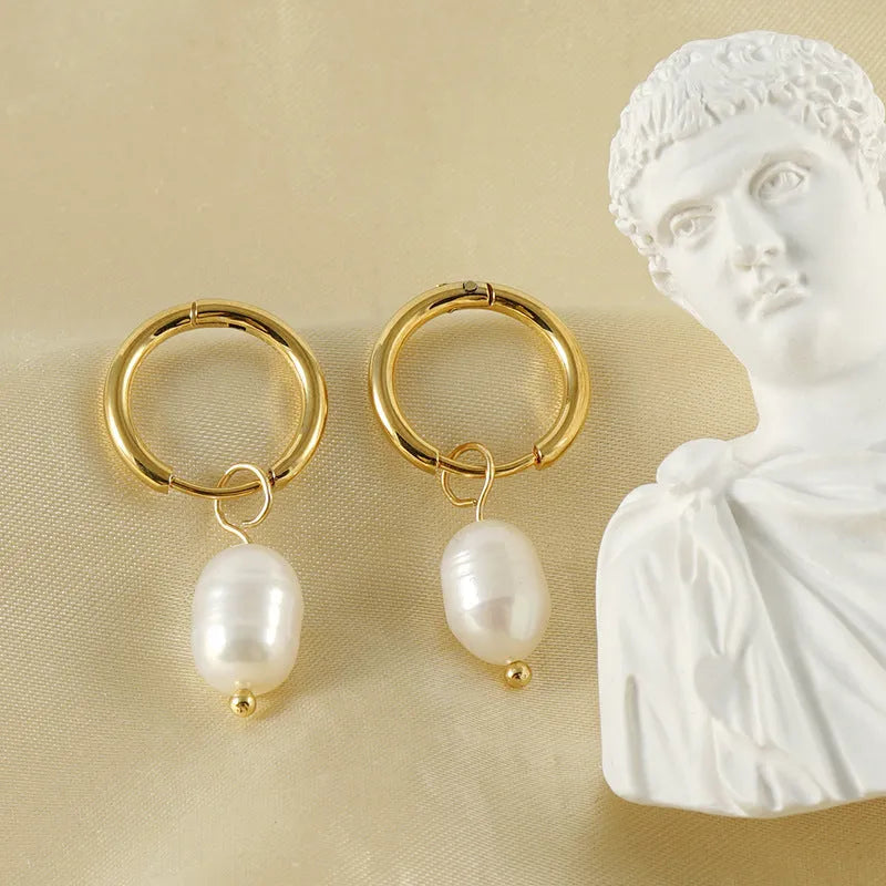 Gold geometric pearl earrings for women made from stainless steel and titanium steel wire.