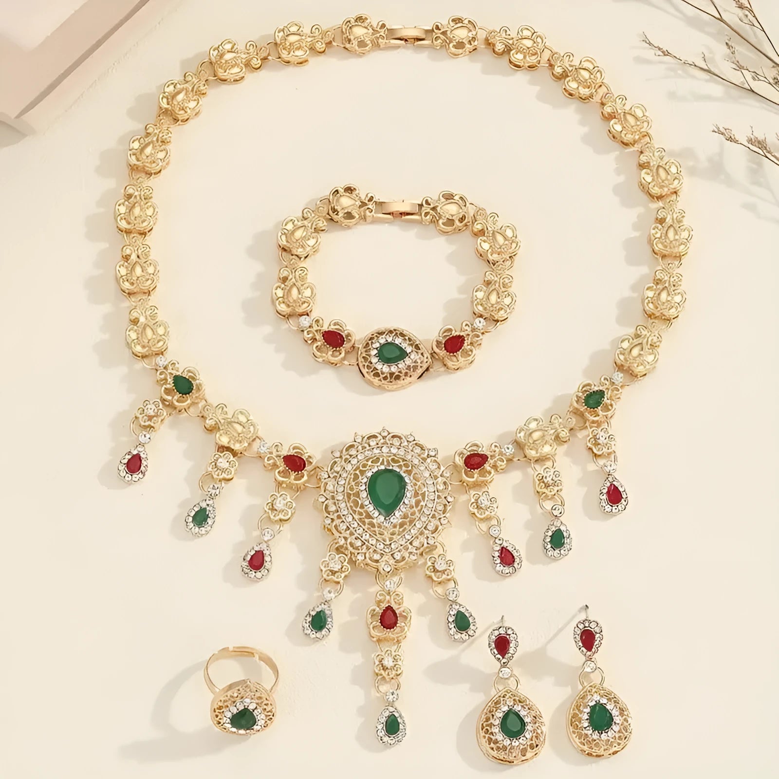 Gold alloy 4-piece jewellery set with bubble and sphere design – earrings, necklace, ring, and bracelet
