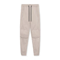 Men's loose grey ankle-tied fitness pants with a casual cut for running and gym workouts.