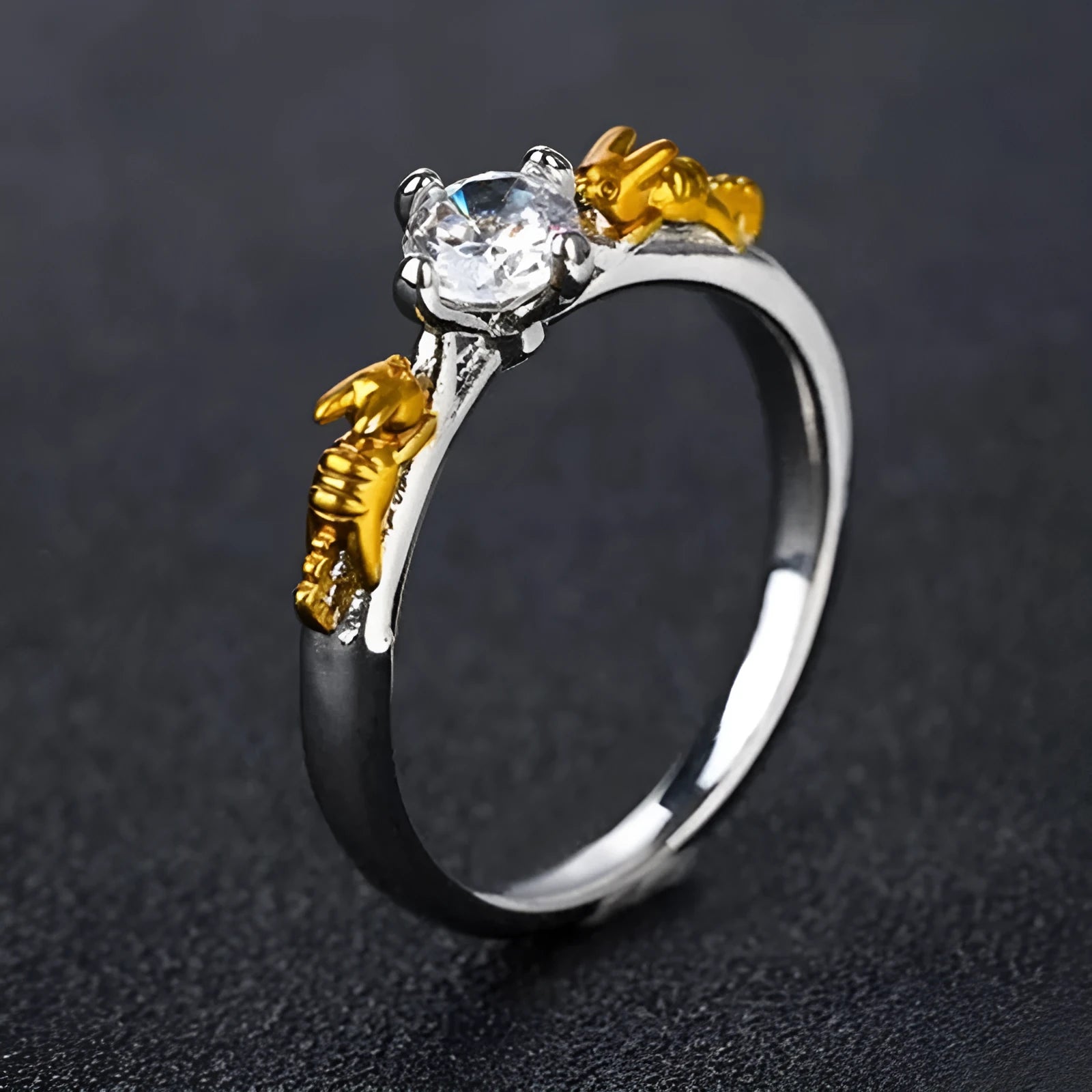 Black gold copper crown modelling ring for cosplay on a plain background.