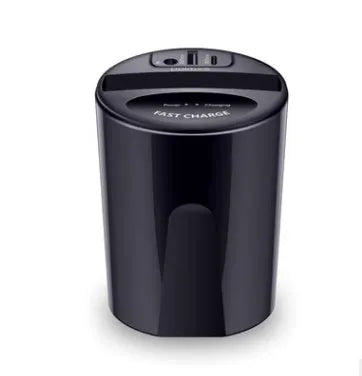 Black X9 car wireless charging cup with detachable base on a car dashboard, showing LED light and phone charging.