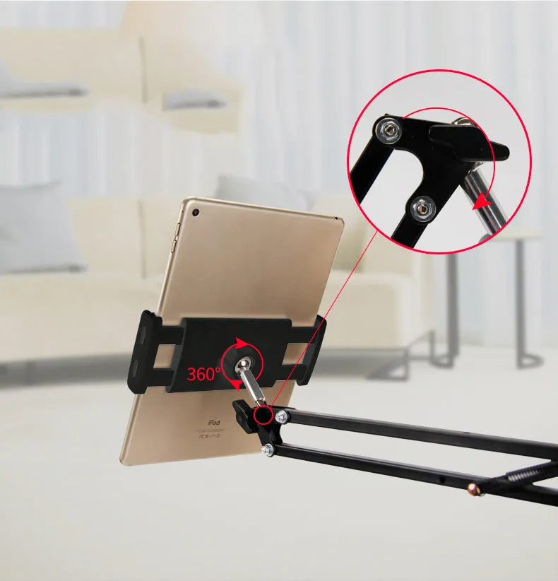 Black and white phone tablet stand on desk holding mobile device