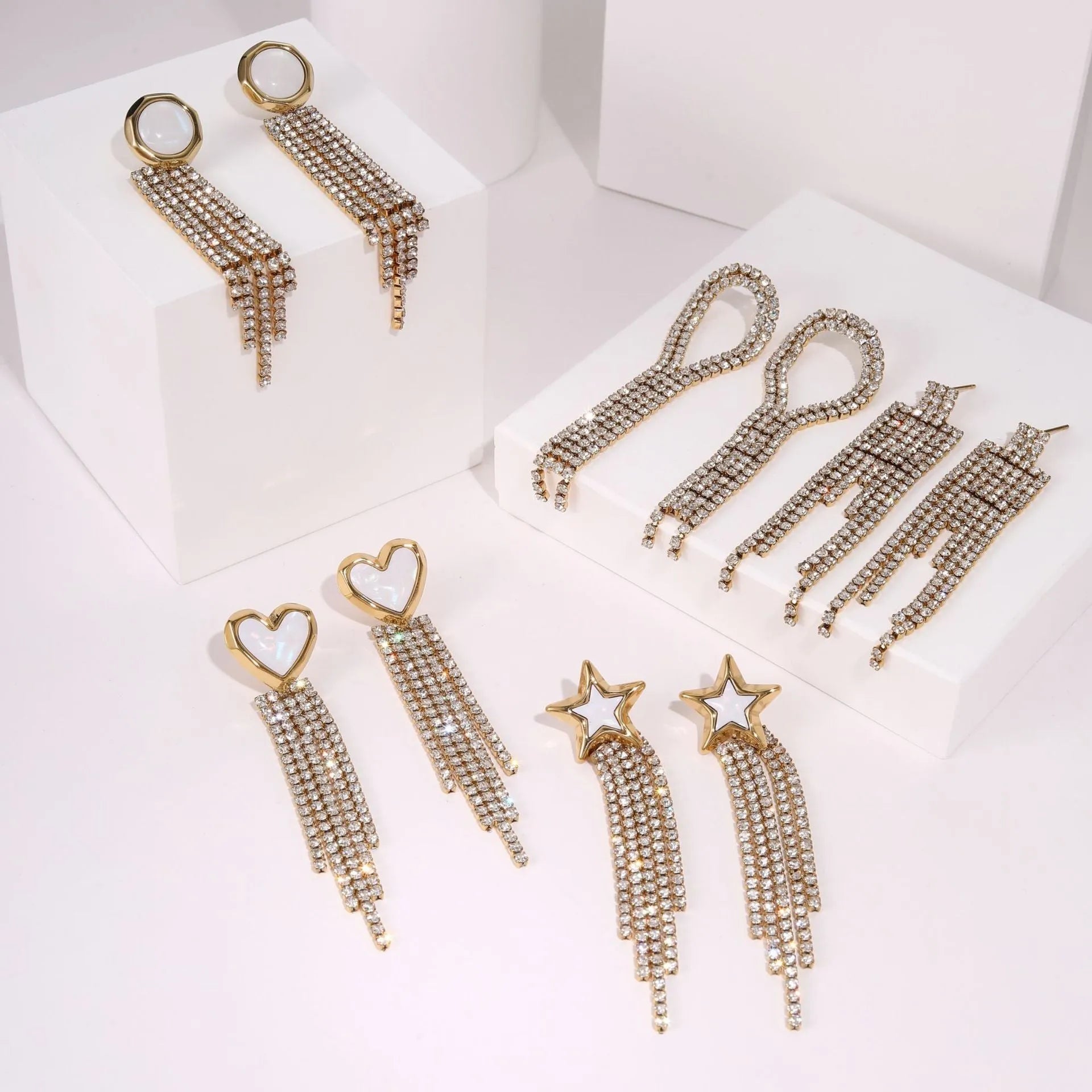 Stainless steel earrings with love heart shape, five-pointed star elements and diamond tassel detailing