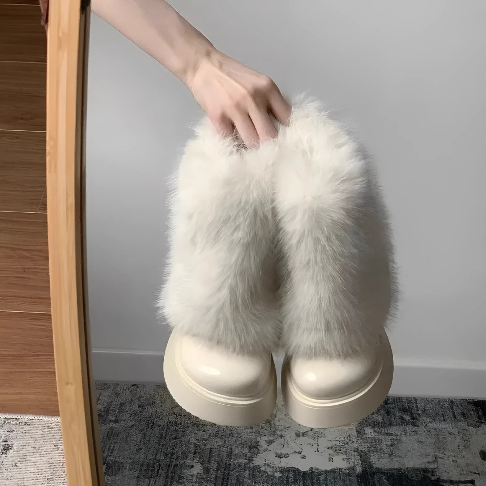 Women's black snow boots with fleece lining, waterproof platform, and rubber sole on a white background
