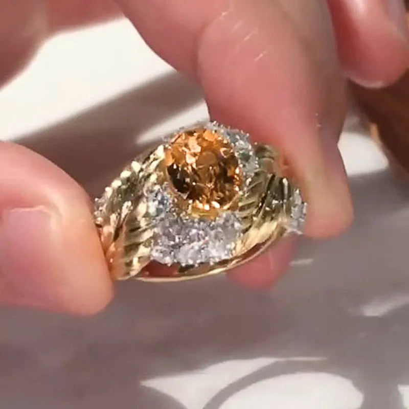 Women's feather embossed copper ring with geometric design and yellow zircon stone inlays