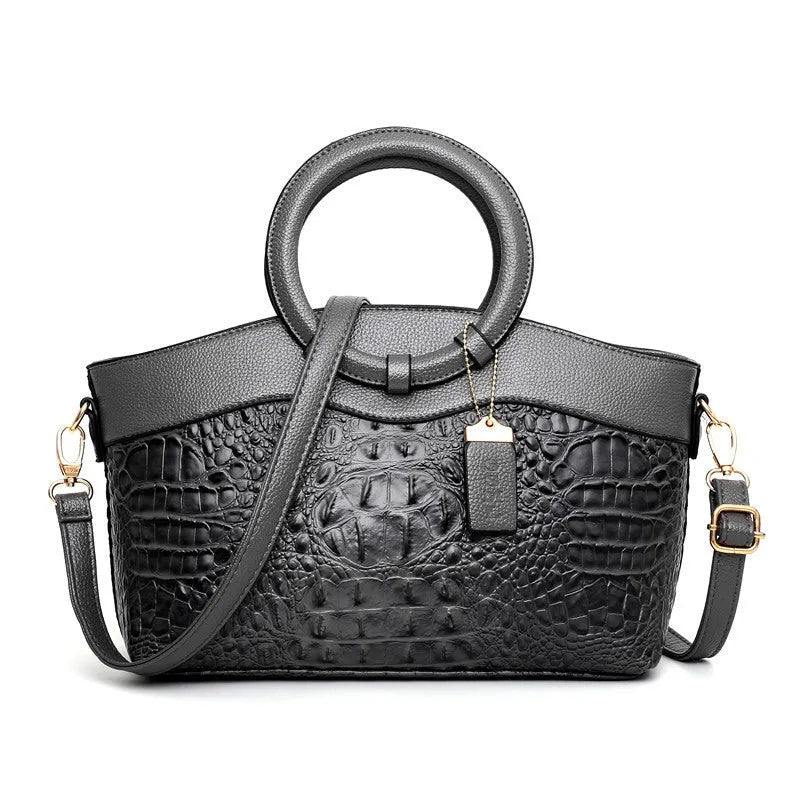 Women's casual fabric shoulder bag in multiple colours showing internal organiser pockets.
