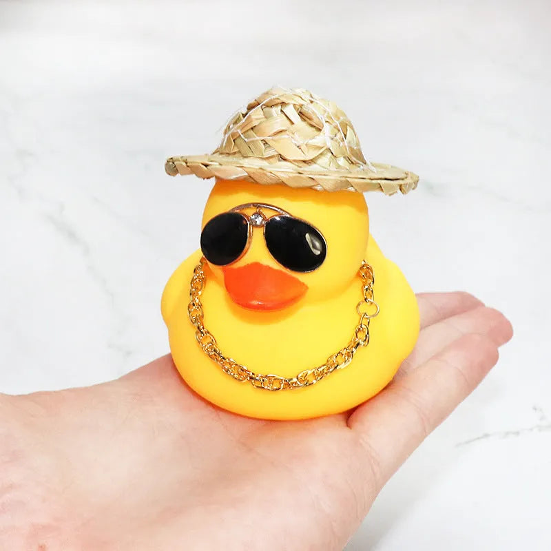 Cartoon straw hat yellow duck car ornament with matte finish, includes base glue and sunglasses necklace
