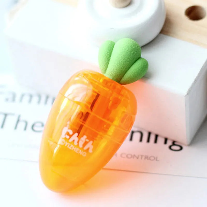 Orange carrot-shaped plastic pencil sharpener with 7cm handle length