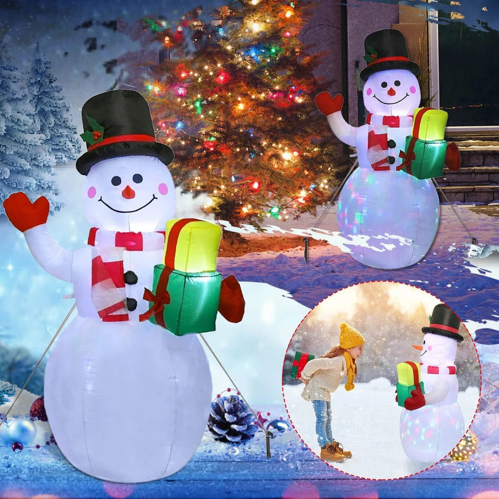 Glowing LED inflatable Christmas decorations including Santa, snowman, and a Christmas tree for outdoor garden use.