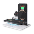 Black and white desktop wireless charging station for phone, headphones, and smartwatch with USB cable.