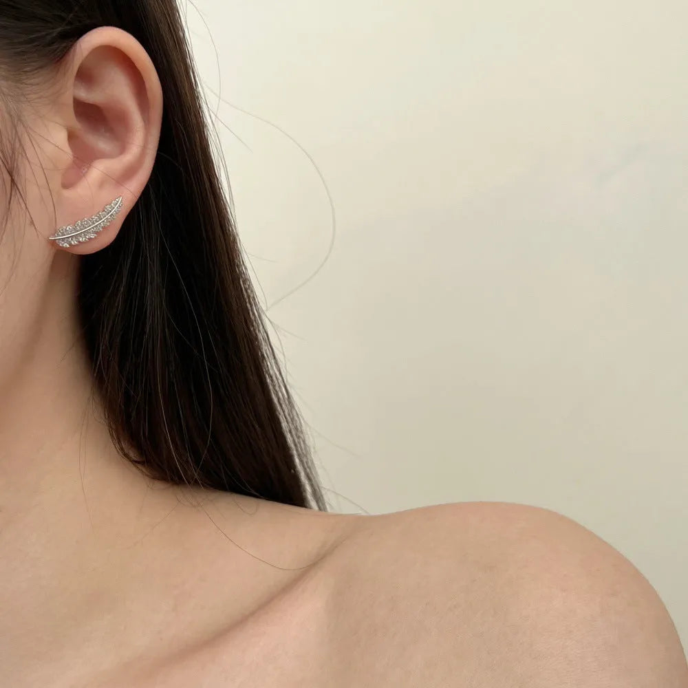 Leaf-shaped zircon inlaid S925 sterling silver stud earrings for women in white gold finish