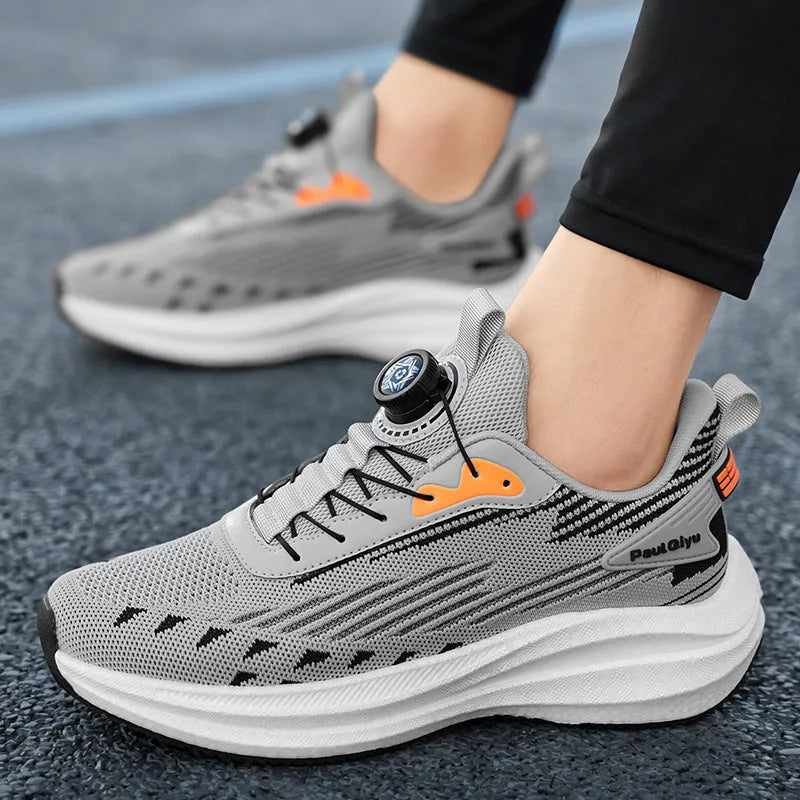 Men's casual sports running shoes with rotating buckle and white green Fly-kit mesh upper on a flat TPU sole.