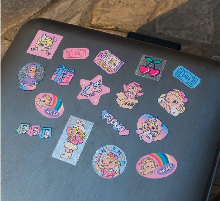 Box containing 16 cute square cartoon stickers in Korean comics style for DIY decoration.