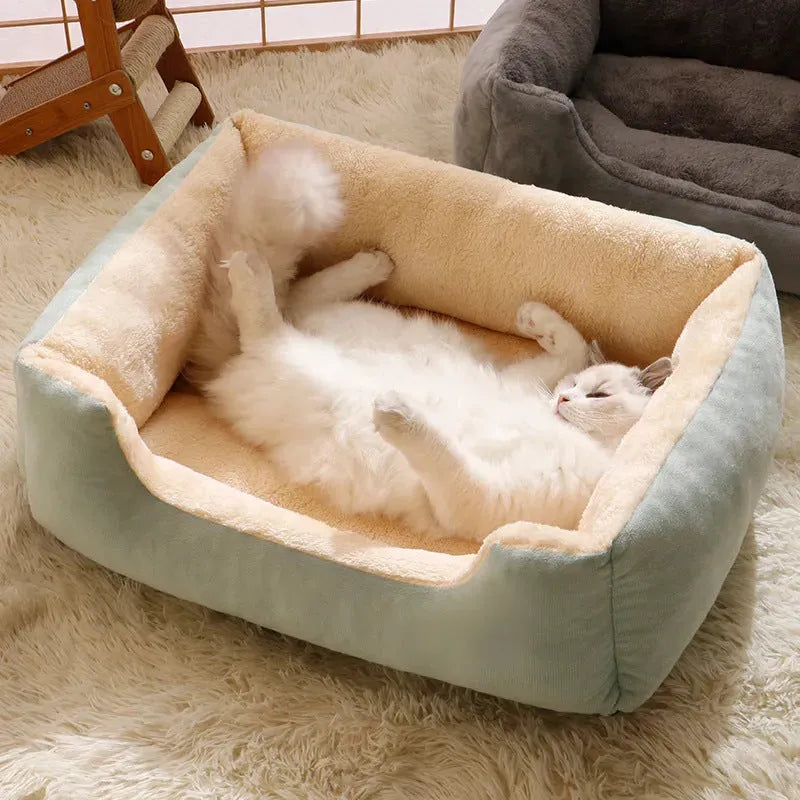 Short plush pet cushion bed for cats and dogs in grey colour, shown in L size 60x45 cm.