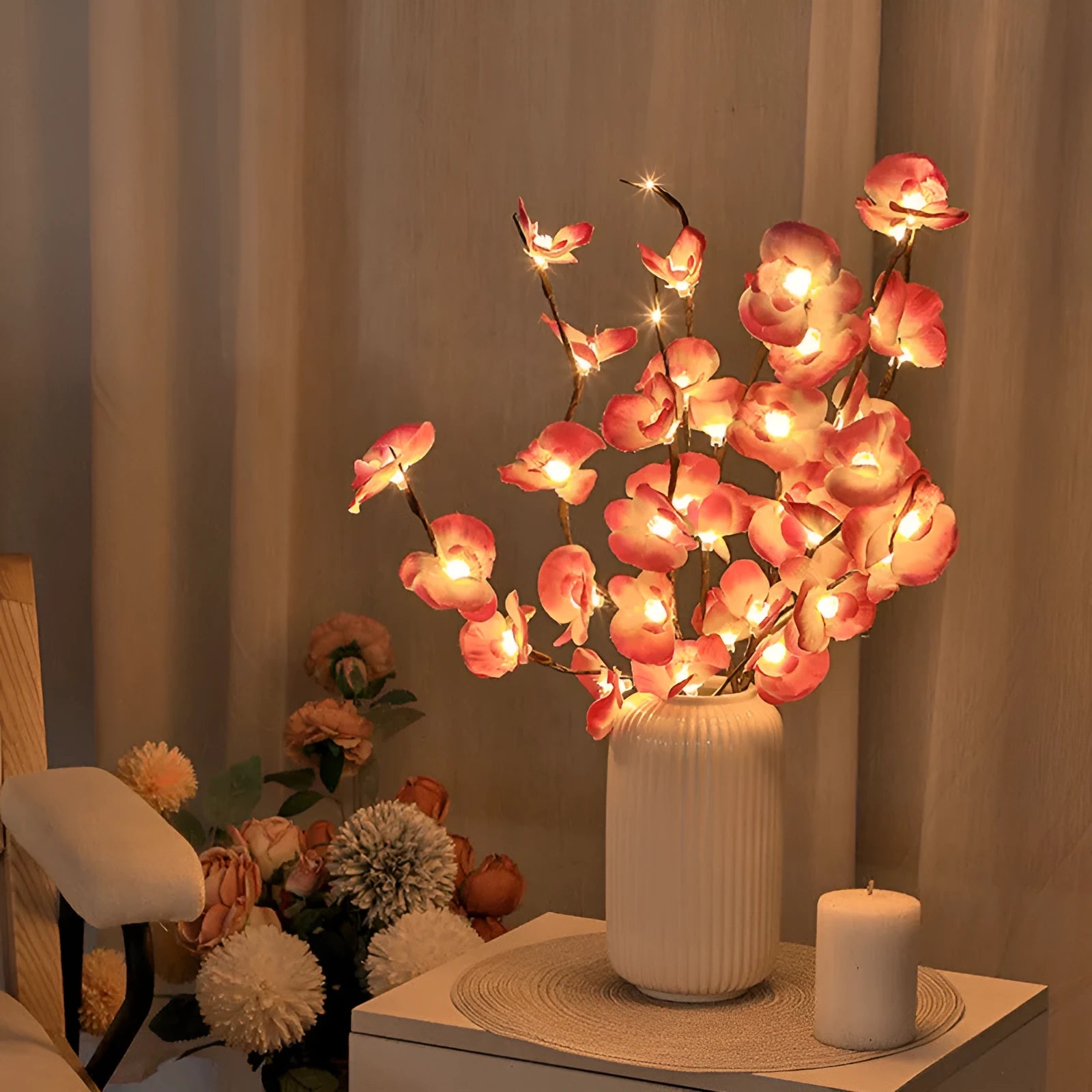 Pink LED phalaenopsis branch decorative light, 65 cm long, for indoor bedroom use.