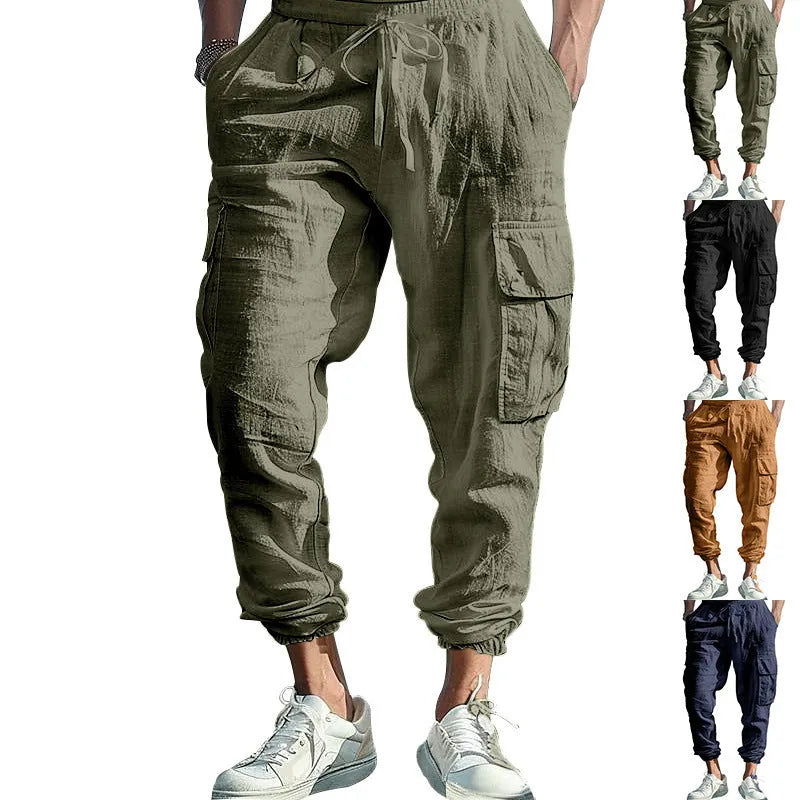 Men's loose-fit linen casual trousers with ankle ties and multiple pockets in a solid colour.