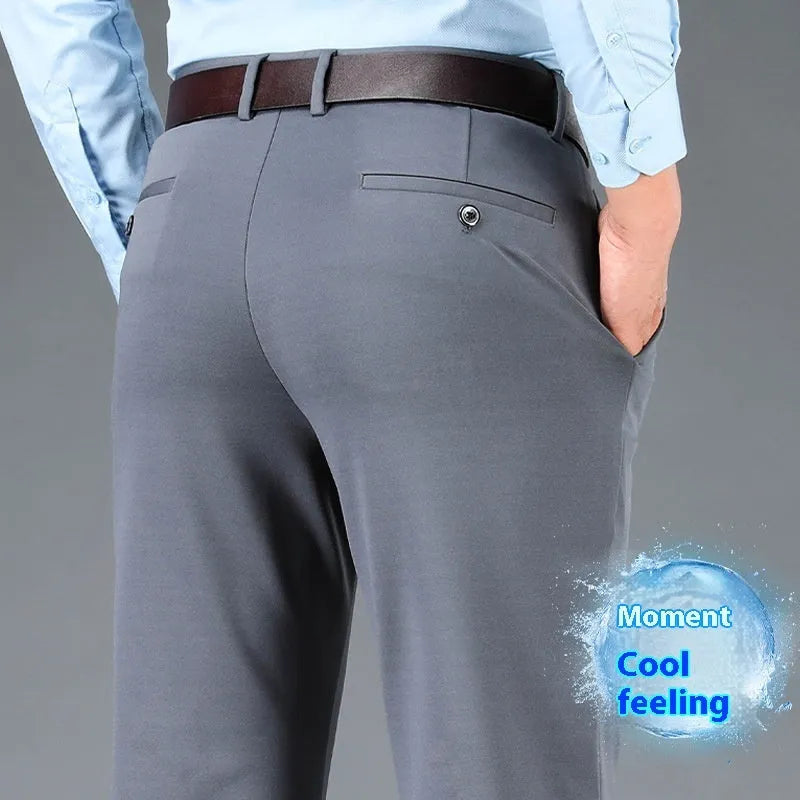 Men's straight-leg trousers in a dark colour on a hanger, showing mid-waist and zip fly design.