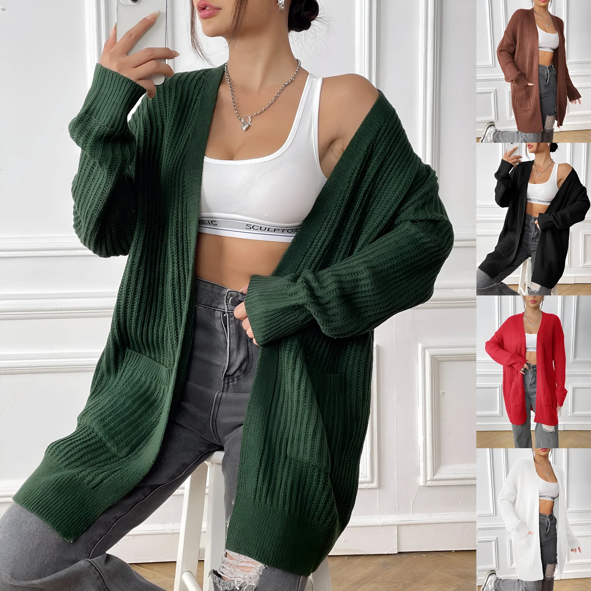Dark green women's loose-fit acrylic cardigan with two pockets and long sleeves.