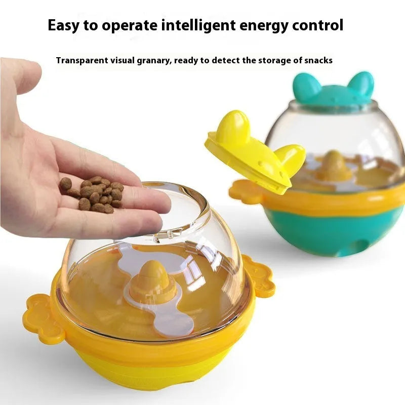Yellow TPR tumbler pet feeder toy for dogs with food-dispensing design
