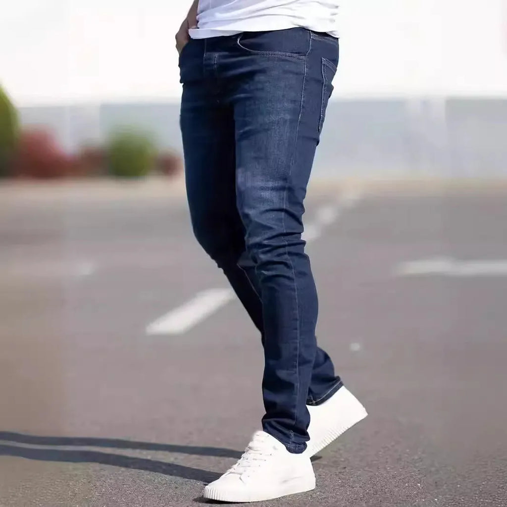 Men's dark blue skinny-fit casual jeans with a zip fly on a mid-waist.
