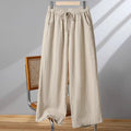 Women's straight-leg trousers with lace-up drawstring waist in apricot colour