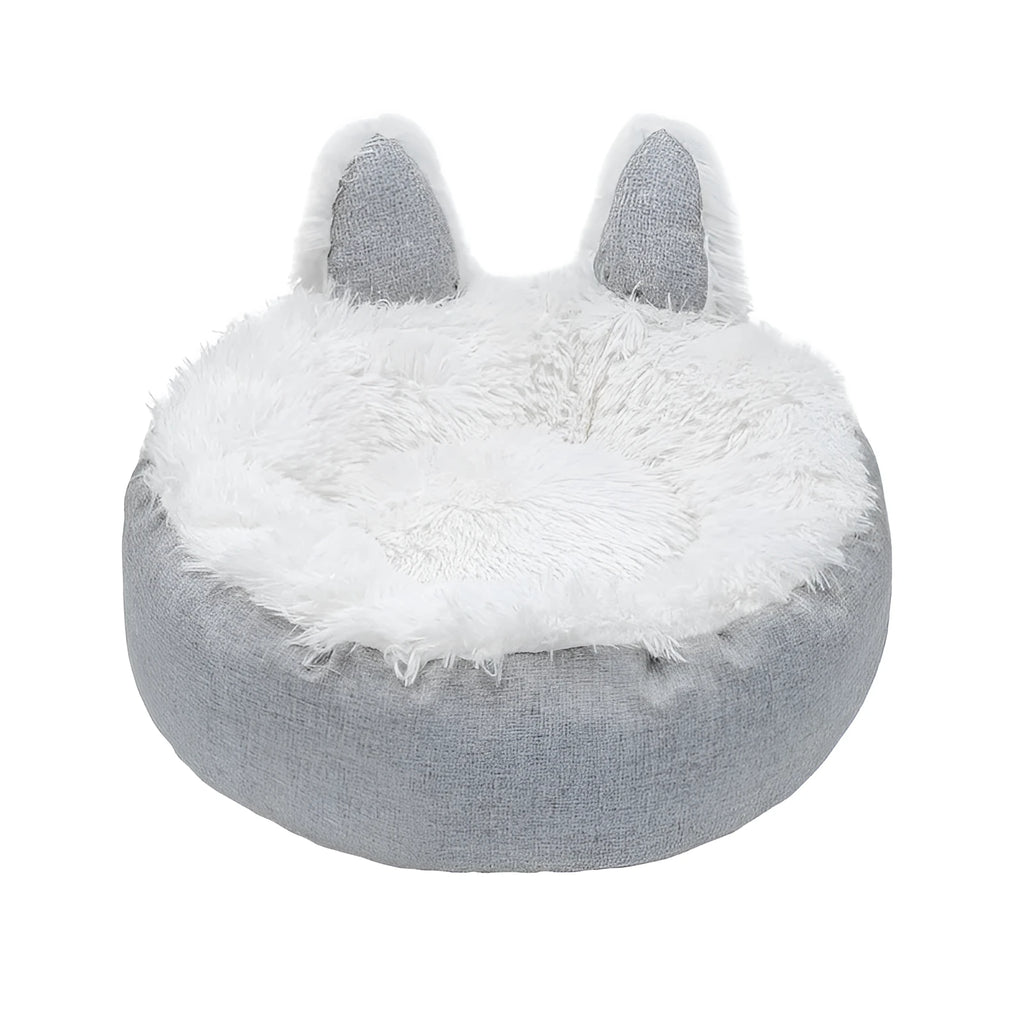 Soft faux fur plush cat bed in grey with fluffy interior – available in multiple sizes and colours for indoor use