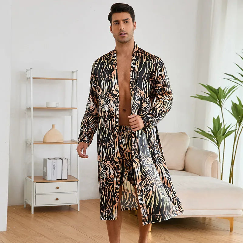 Men's tiger pattern print bathrobe and matching shorts set laid flat.