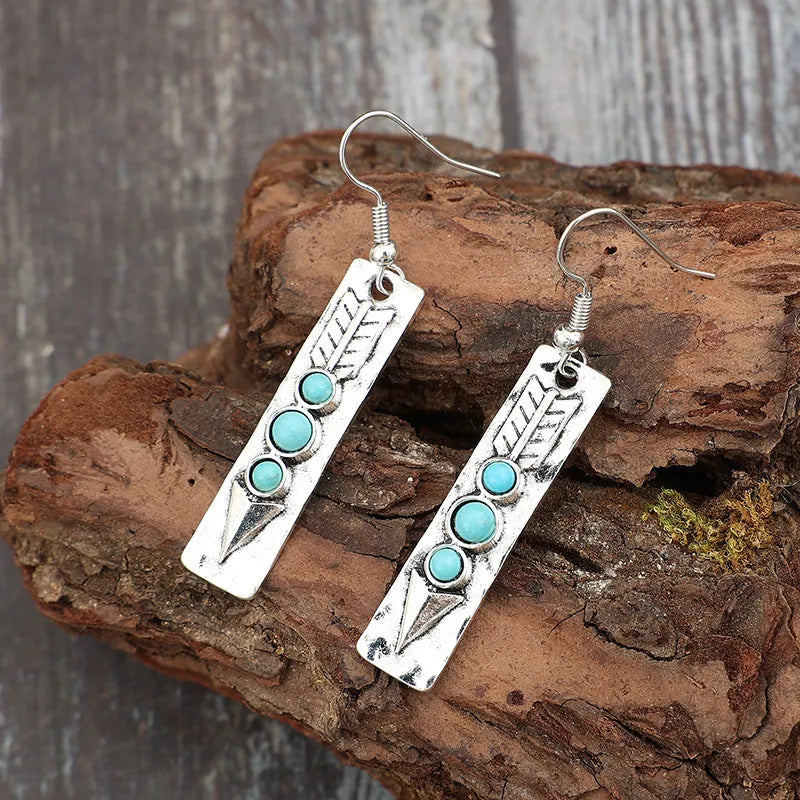Silver geometric retro earrings with turquoise inlay on long strip zinc alloy design