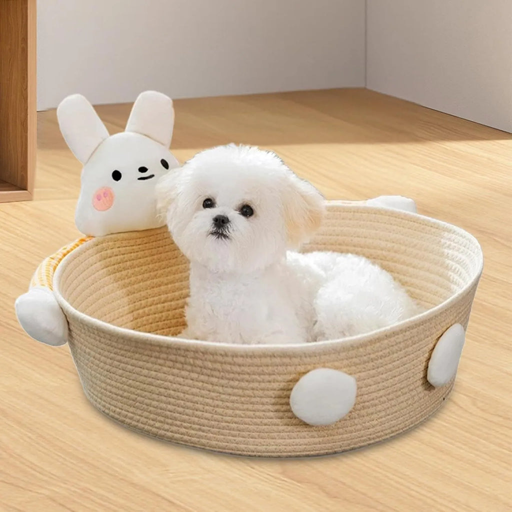 Woven cotton rope cat bed with integrated scratching surface in rabbit motif