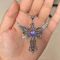 Geometric alloy pendant necklace featuring detailed devil wings and a cross, shown in multiple colour options.
