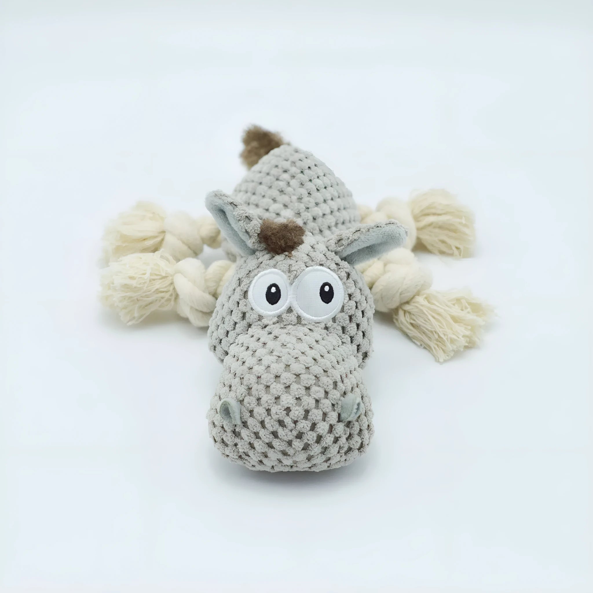 Grey donkey plush dog toy with creaking sound mechanism