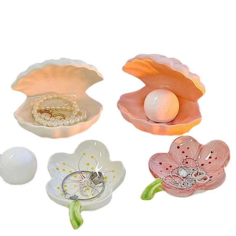White porcelain storage box tray with optional small night light, in pink or white shell colours.