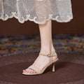 Women's small size suede sandals with high heel strap, round toe, black, 7cm heel, side view