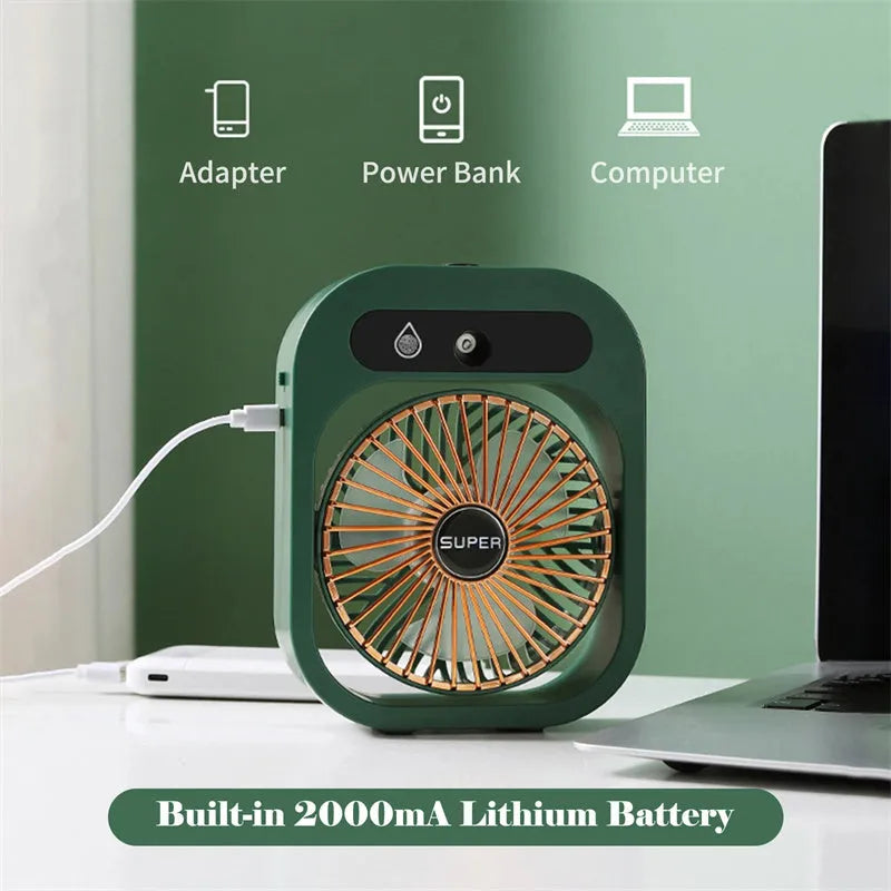 Green and white USB portable misting fan air cooler humidifier on a desk