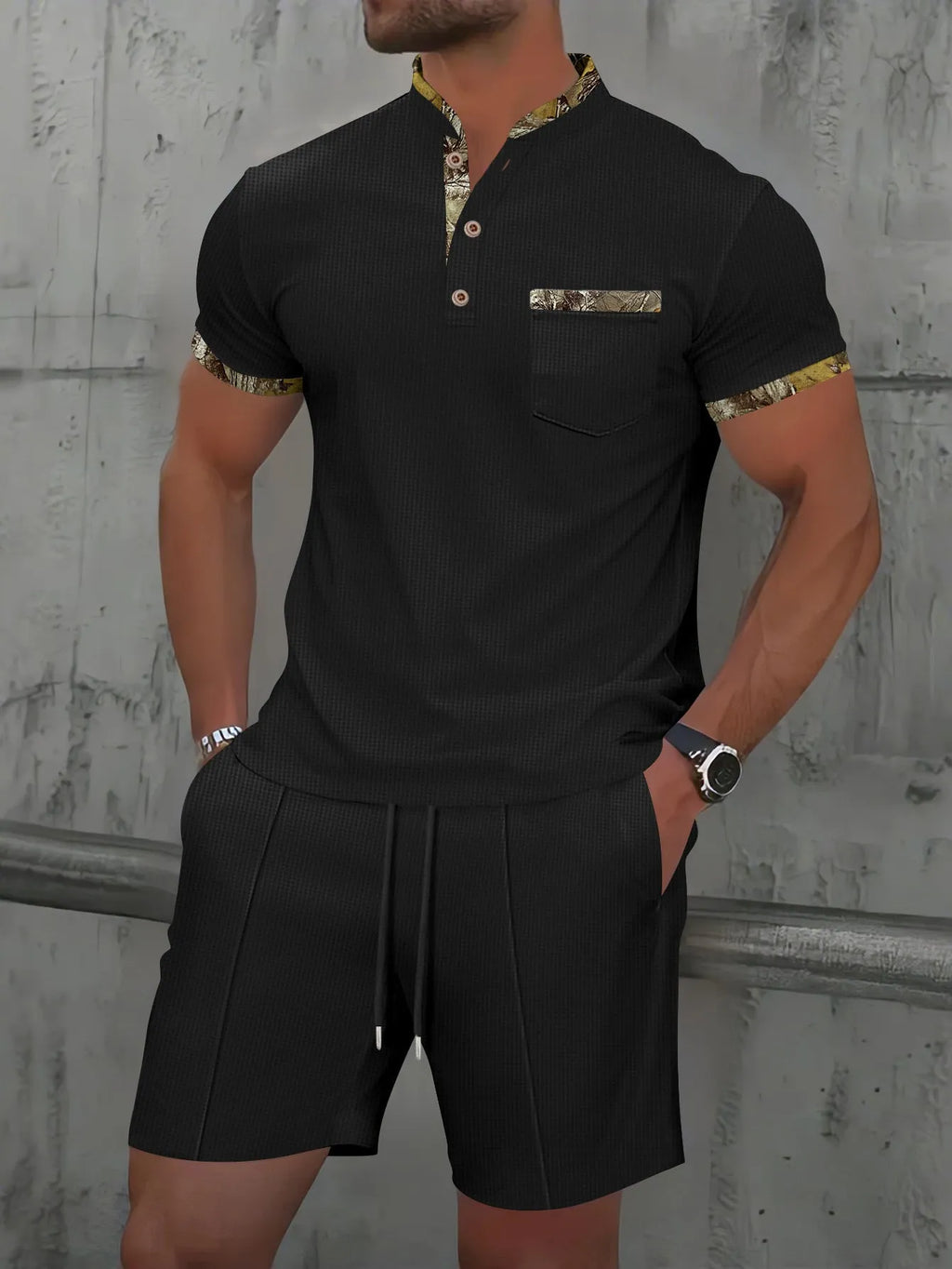Men's grey short sleeve zip-front polo top and matching shorts on a hanger.