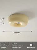 American style cream coloured bedroom ceiling lamp with three-colour light fitting on a white ceiling.