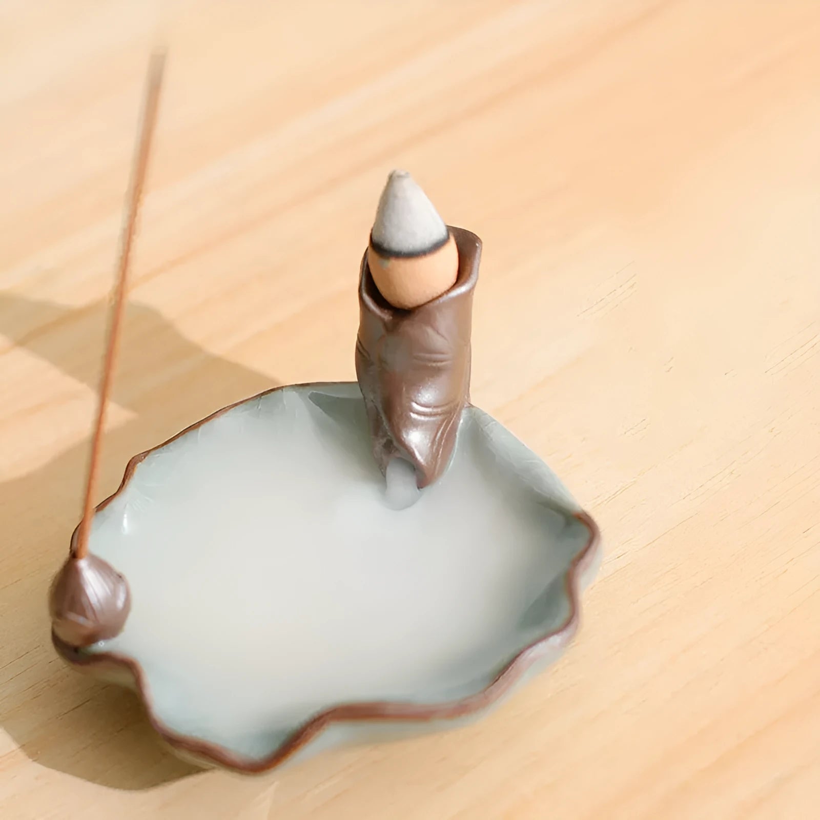 Ceramic reverse flow incense burner with purple clay construction and Ge kiln process
