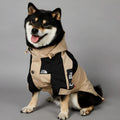 Khaki coloured polyester dog shell jacket for medium and large breeds on a mannequin.