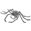 Grey and black spider Halloween costume on a dog showing back covering and adjustable leg straps.