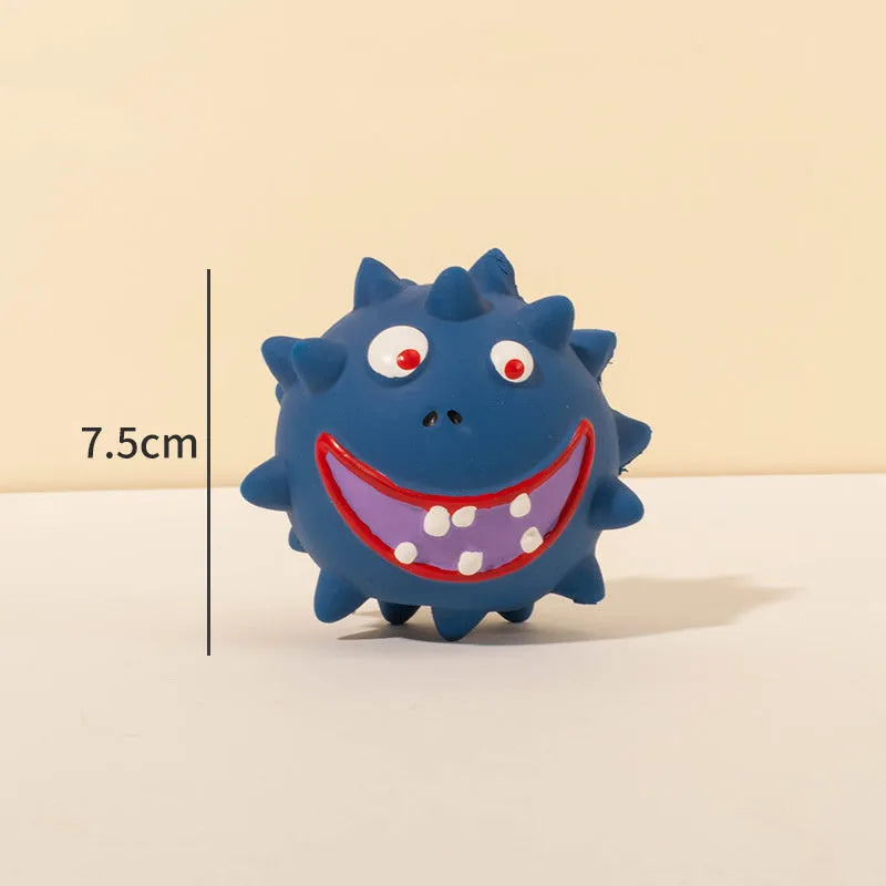 Four colourful squeaky dog balls with cute faces made from natural latex rubber
