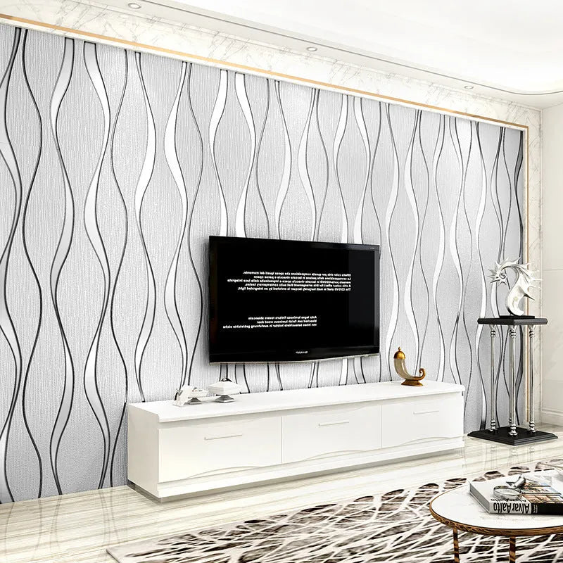 Close-up of light grey curve stripe 3D velvet wallpaper texture on a non-woven roll