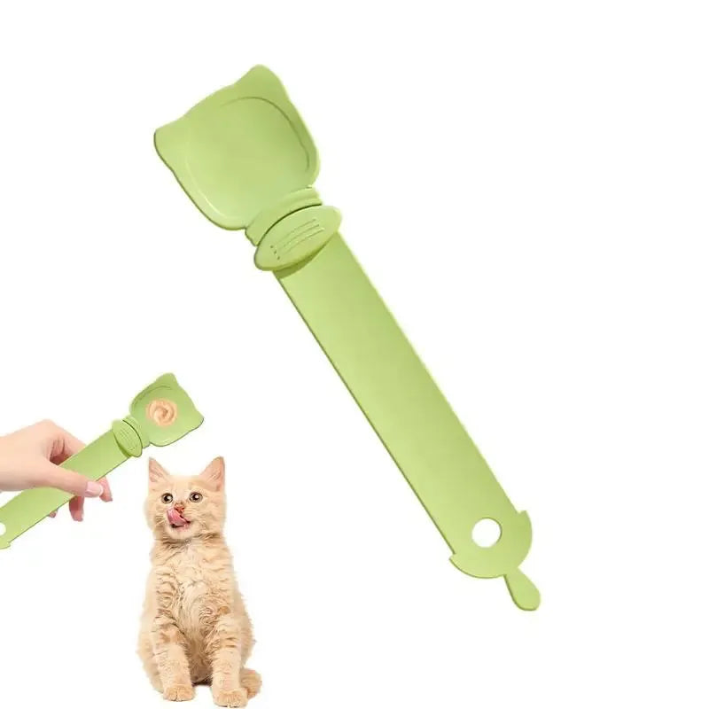 Cat Treat Spoon in green, orange, and white, measuring 27 x 6.5 cm, designed for scooping and serving cat strips