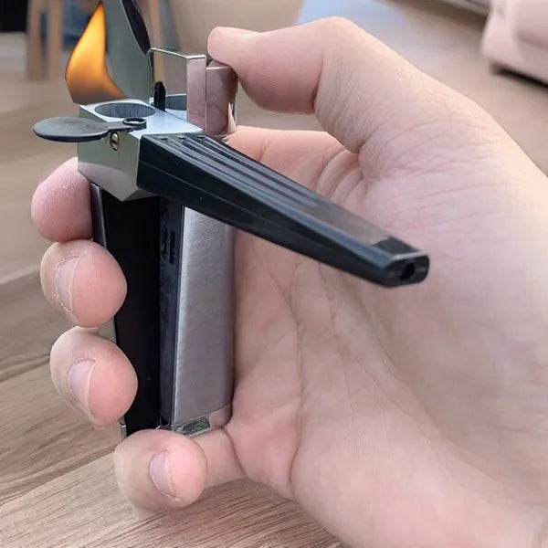 Silver foldable metal pipe lighter in open position showing flame mechanism and storage compartment.