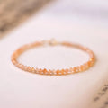Sunstone crystal fortune bracelet with 3mm ultra-thin beads on female wrist