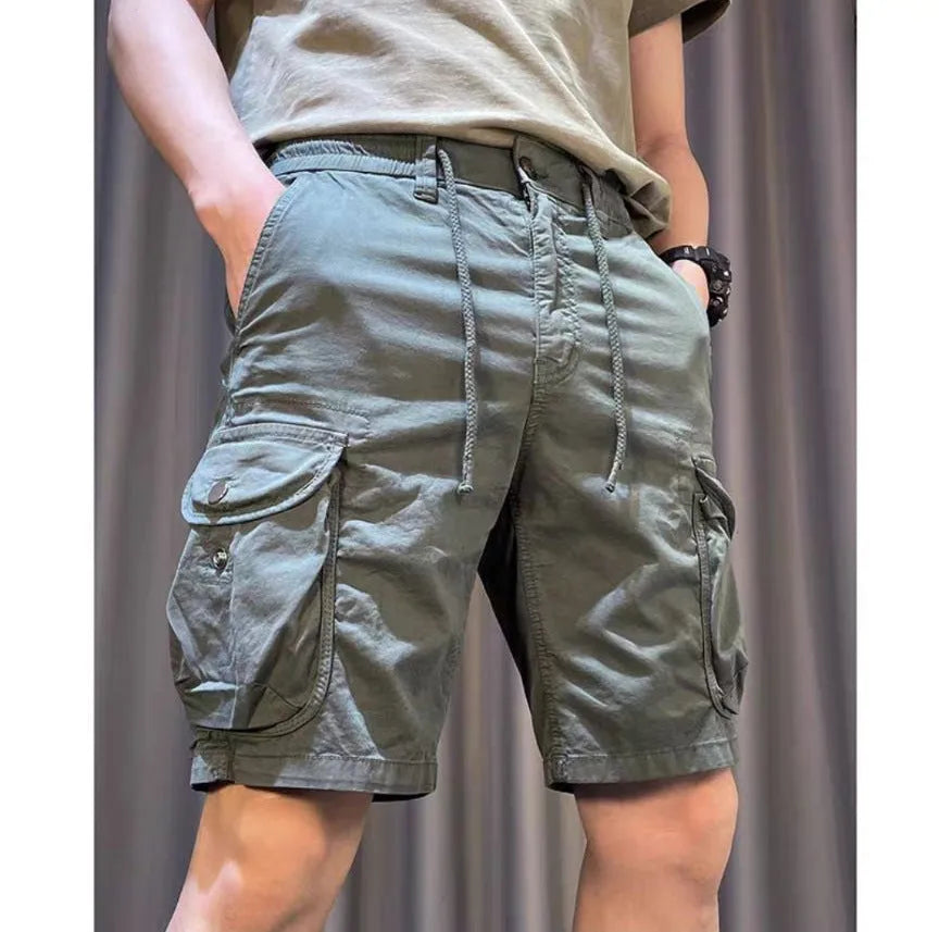 Loose straight-leg casual overalls in khaki with multiple pockets and a Korean-style fit.