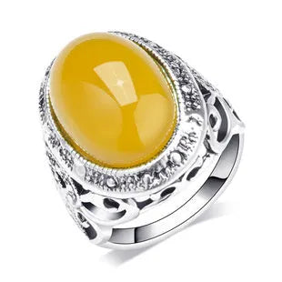 Fluorescent beeswax alloy electroplated ring in antique silver amber colour with a geometric retro design.