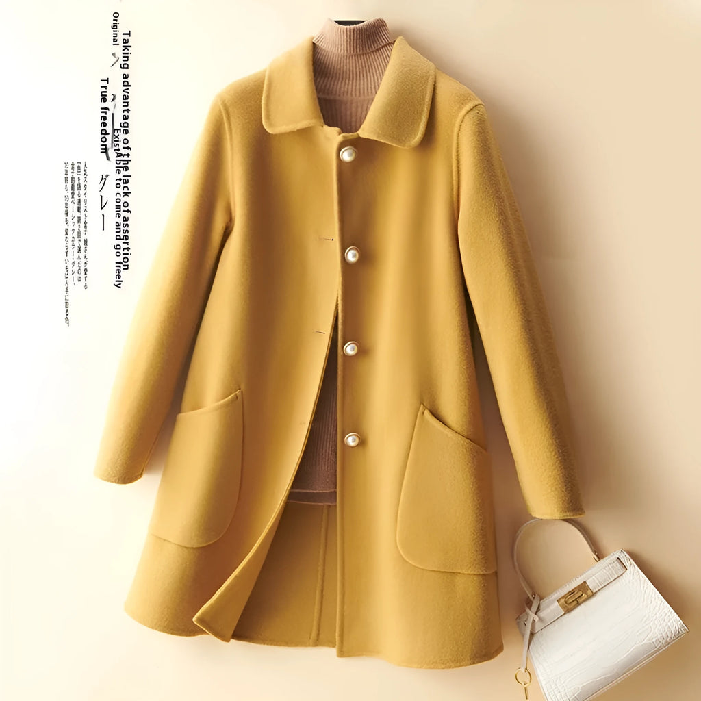Women's mid-length wool coat with pearl buckle fastening and doll collar in solid colour